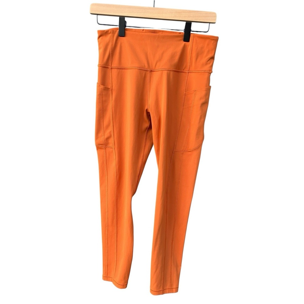 Athleta Womens Ultimate Stash 7/8 Leggings Size M Pockets Burnt Orange Gameday